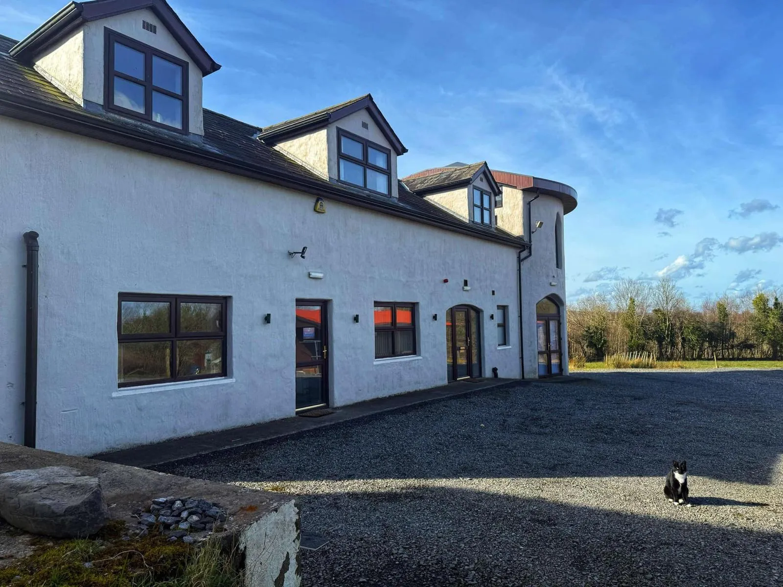 Garden and accommodation exterior at Shambala Holistic Retreat Centre, Derrylin, Co. Fermanagh